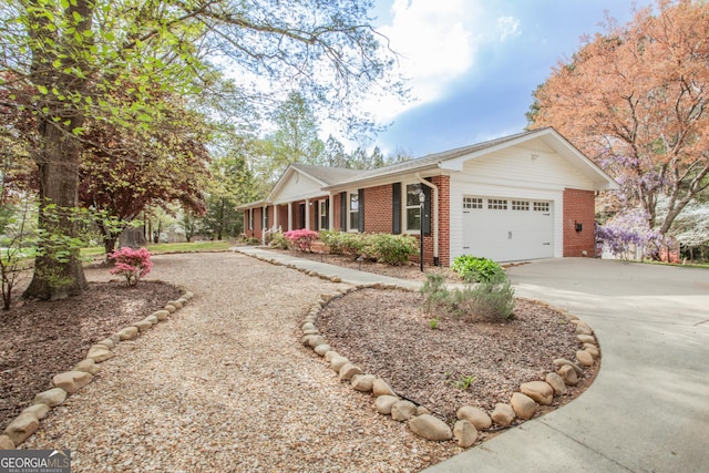 724 Ga Highway 120, Tallapoosa, GA 30176 - single story home featuring concrete driveway, brick siding, and an attached garage