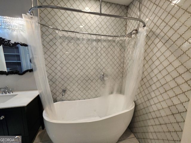 220 Renaissance Pkwy NE Apt 2220, Atlanta, GA 30308 - full bath featuring shower / bath combo, vanity, and tile patterned flooring