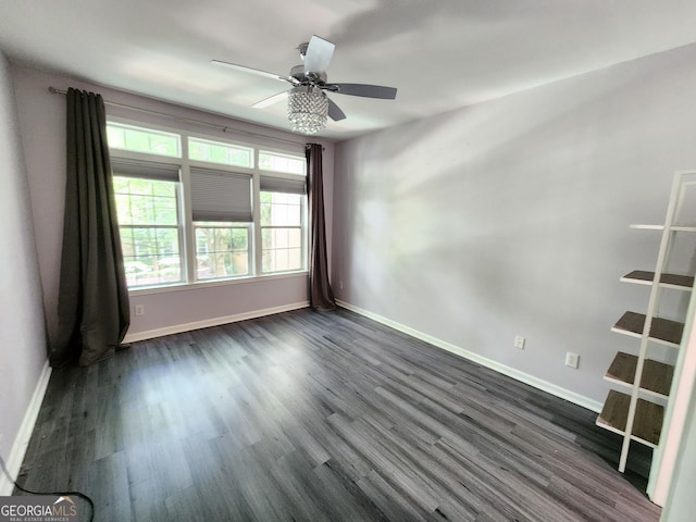 220 Renaissance Pkwy NE Apt 2220, Atlanta, GA 30308 - unfurnished room featuring baseboards, dark wood-style floors, and ceiling fan