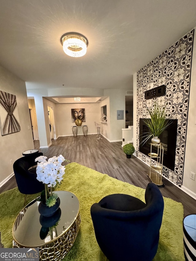 220 Renaissance Pkwy NE Apt 2220, Atlanta, GA 30308 - living room featuring wood finished floors and baseboards