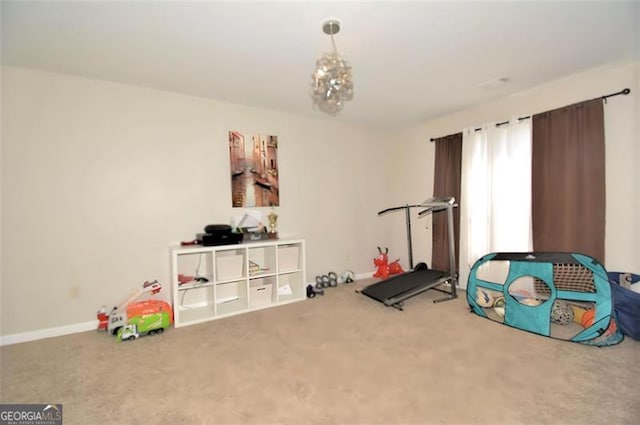 interior space featuring carpet flooring and baseboards