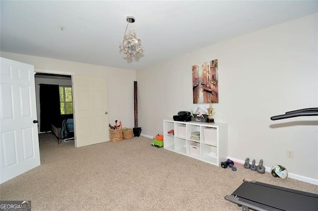 interior space with carpet floors and baseboards