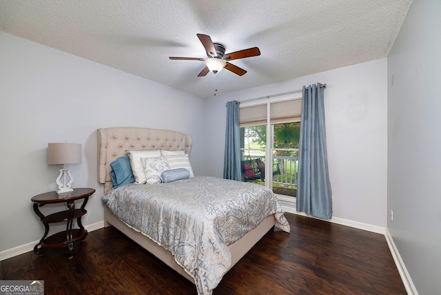 bedroom featuring access to outside, a textured ceiling, a ceiling fan, baseboards, and wood finished floors