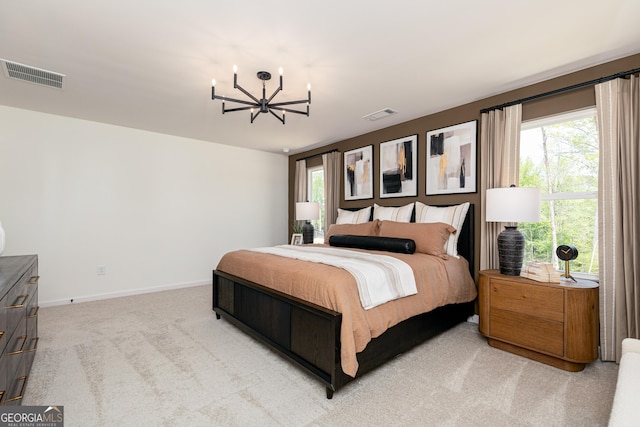 bedroom featuring a chandelier, visible vents, baseboards, and light carpet