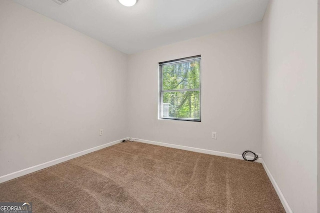 3690 Asbury Ln SW, Atlanta, GA 30331 - carpeted empty room featuring baseboards