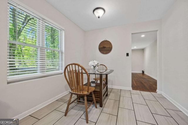 3690 Asbury Ln SW, Atlanta, GA 30331 - dining space with wood tiled floors and baseboards
