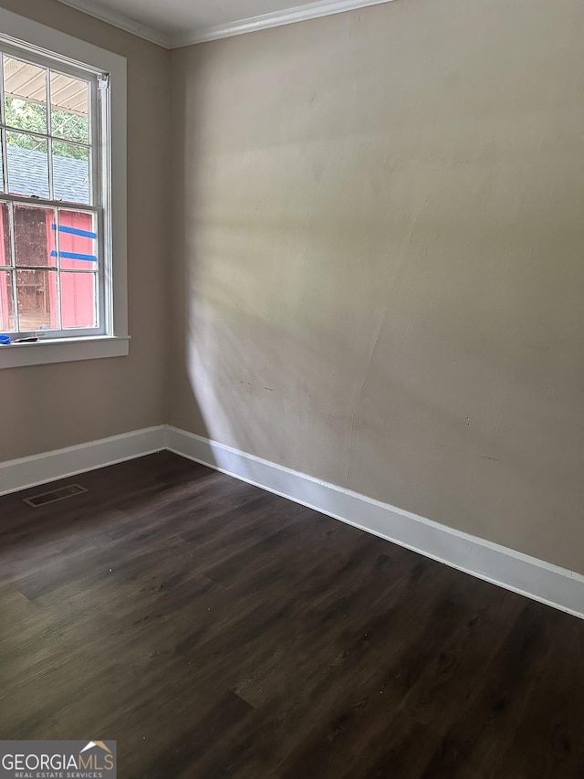 4 I Ave, Gainesville, GA 30504 - spare room with dark wood-type flooring, crown molding, baseboards, and visible vents