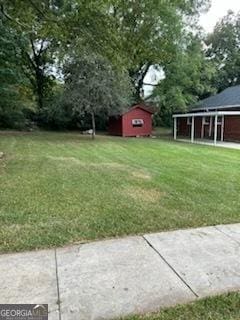 4 I Ave, Gainesville, GA 30504 - view of yard with a storage shed and an outbuilding