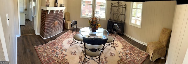 4 I Ave, Gainesville, GA 30504 - living area with baseboards, wood finished floors, and a fireplace