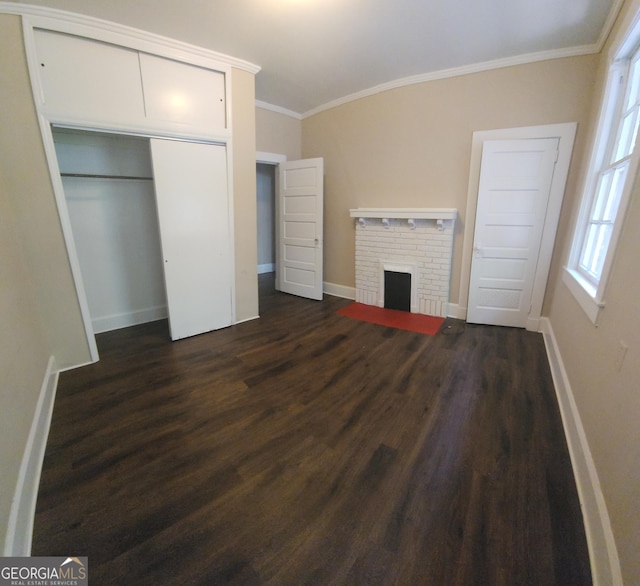 4 I Ave, Gainesville, GA 30504 - unfurnished living room featuring crown molding, a fireplace, dark wood finished floors, and baseboards