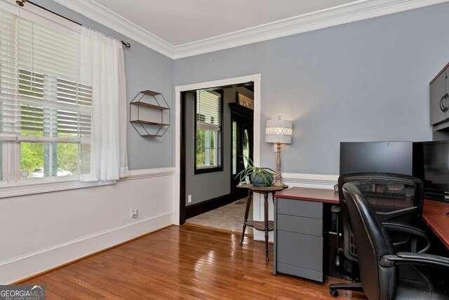 1055 River Bluff Dr, Winder, GA 30680 - office with ornamental molding, a wealth of natural light, wood finished floors, and baseboards