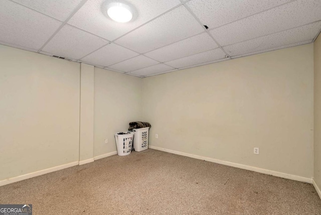 1055 River Bluff Dr, Winder, GA 30680 - finished below grade area with carpet flooring, a drop ceiling, and baseboards