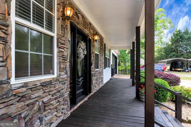 1055 River Bluff Dr, Winder, GA 30680 - wooden terrace with a porch
