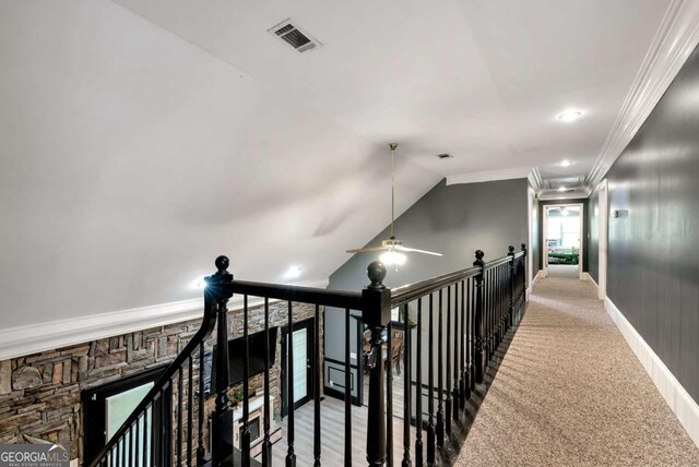 1055 River Bluff Dr, Winder, GA 30680 - hall featuring ornamental molding, visible vents, lofted ceiling, an upstairs landing, and baseboards