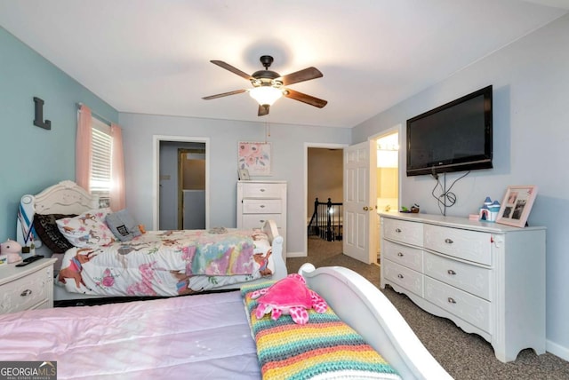 1055 River Bluff Dr, Winder, GA 30680 - carpeted bedroom with baseboards and a ceiling fan