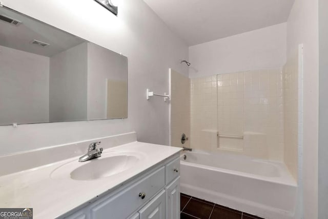 1055 River Bluff Dr, Winder, GA 30680 - bathroom with visible vents, shower / tub combination, tile patterned flooring, and vanity