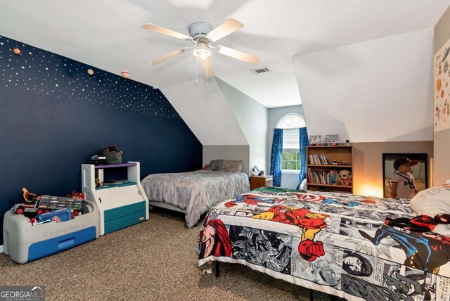 1055 River Bluff Dr, Winder, GA 30680 - bedroom with visible vents, vaulted ceiling, a ceiling fan, and carpet