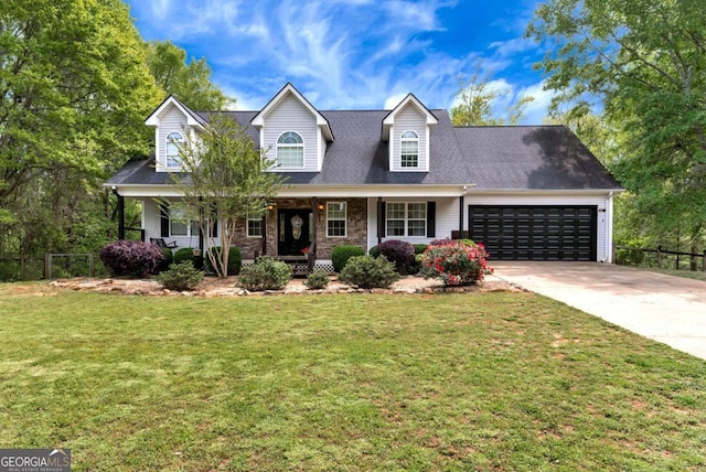 1055 River Bluff Dr, Winder, GA 30680 - cape cod home with driveway, a front lawn, a porch, a garage, and fence