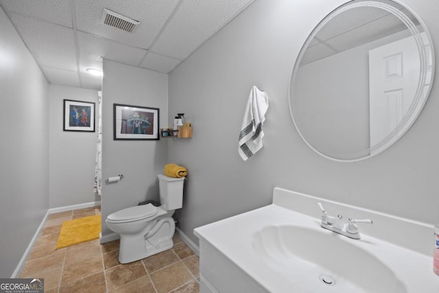 4016 Upland Trce, Marietta, GA 30066 - bathroom with a paneled ceiling, baseboards, visible vents, and toilet