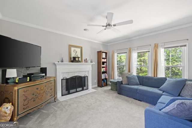 4016 Upland Trce, Marietta, GA 30066 - carpeted living room featuring a premium fireplace, ceiling fan, and ornamental molding
