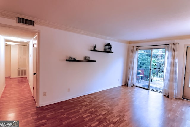 1181 Church St Unit D, Decatur, GA 30030 - unfurnished room featuring wood finished floors and ornamental molding