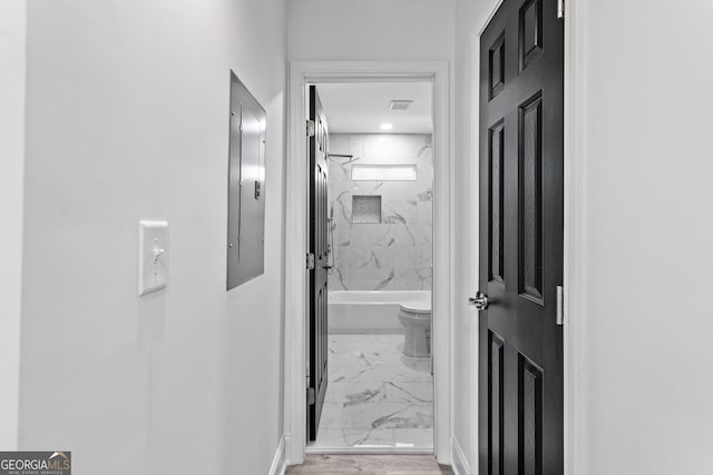 849 Wood St NW, Atlanta, GA 30318 - hall with marble finish floor, baseboards, visible vents, and electric panel