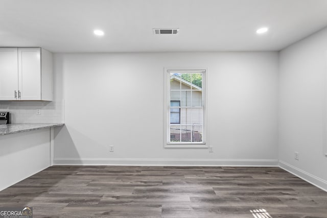 849 Wood St NW, Atlanta, GA 30318 - unfurnished dining area with visible vents, recessed lighting, and dark wood finished floors