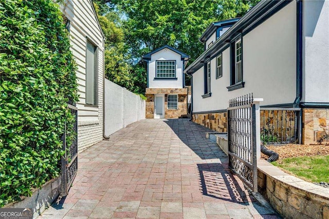 view of patio featuring fence
