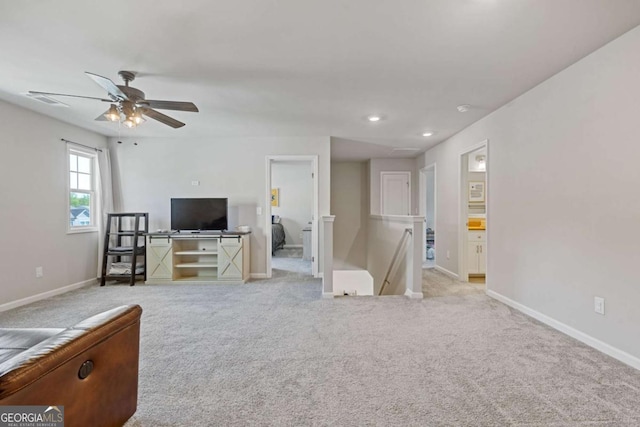 living area with a ceiling fan, baseboards, carpet, and recessed lighting