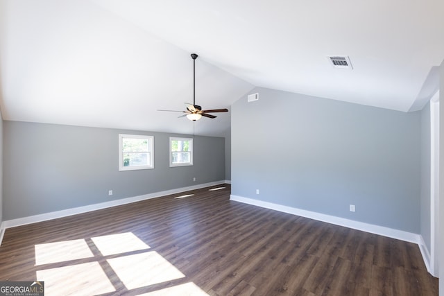 710 Avalon Rd, Thomaston, GA 30286 - empty room featuring vaulted ceiling, ceiling fan, dark wood-style floors, and baseboards