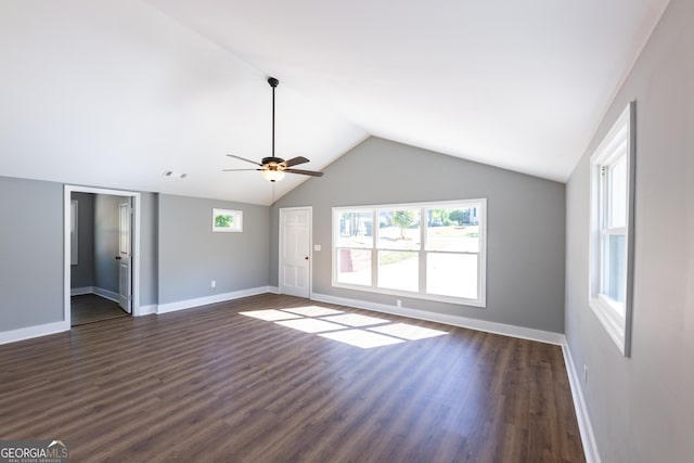 710 Avalon Rd, Thomaston, GA 30286 - unfurnished living room featuring dark wood-style flooring, lofted ceiling, baseboards, and a ceiling fan