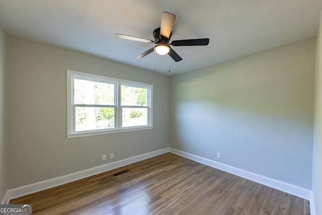 710 Avalon Rd, Thomaston, GA 30286 - empty room with baseboards, wood finished floors, and ceiling fan