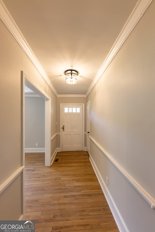 710 Avalon Rd, Thomaston, GA 30286 - entrance foyer with ornamental molding, wood finished floors, and baseboards