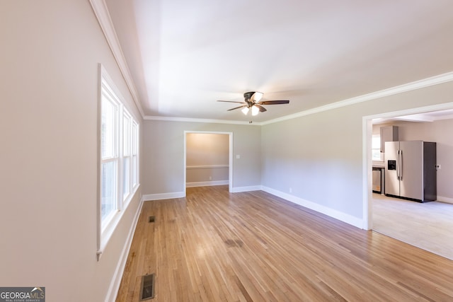 710 Avalon Rd, Thomaston, GA 30286 - unfurnished room featuring ceiling fan, light wood-style floors, healthy amount of natural light, baseboards, and ornamental molding