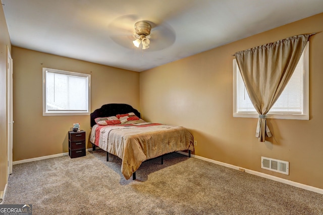 77 Crystal River Dr, Riverdale, GA 30274 - carpeted bedroom featuring baseboards and a ceiling fan