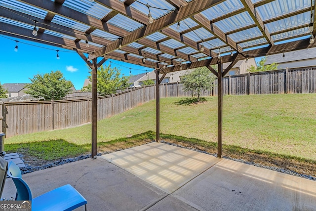 view of patio with a pergola and a fenced backyard