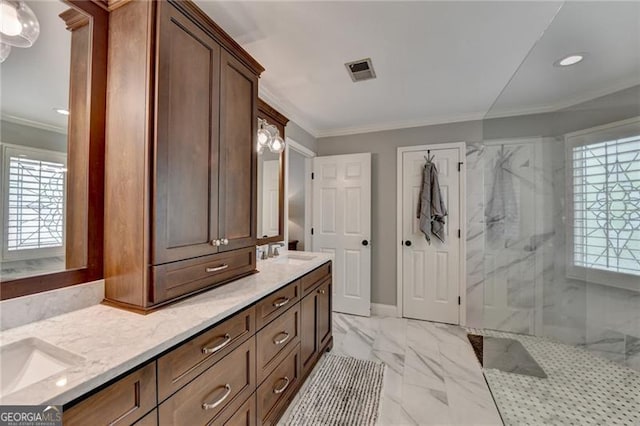 bathroom with a marble finish shower, double vanity, visible vents, marble finish floor, and ornamental molding