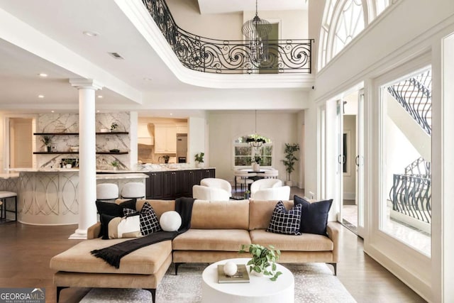 3511 Roxboro Rd NE, Atlanta, GA 30326 - interior space with visible vents, recessed lighting, a notable chandelier, ornate columns, and wood finished floors