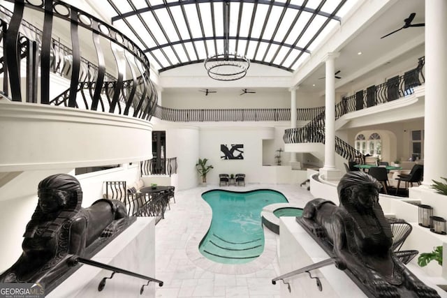 3511 Roxboro Rd NE, Atlanta, GA 30326 - view of pool featuring a pool with connected hot tub and ornate columns