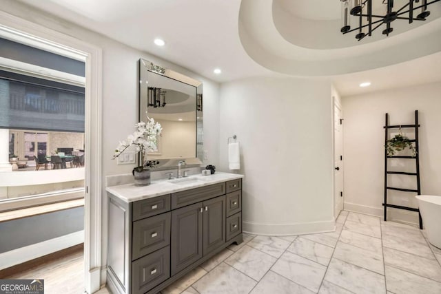 3511 Roxboro Rd NE, Atlanta, GA 30326 - full bath featuring vanity, a freestanding tub, recessed lighting, and a chandelier