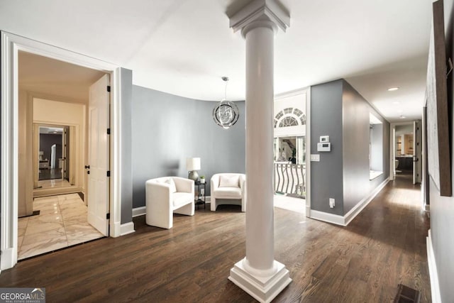 3511 Roxboro Rd NE, Atlanta, GA 30326 - corridor featuring dark wood-style floors, baseboards, recessed lighting, and decorative columns