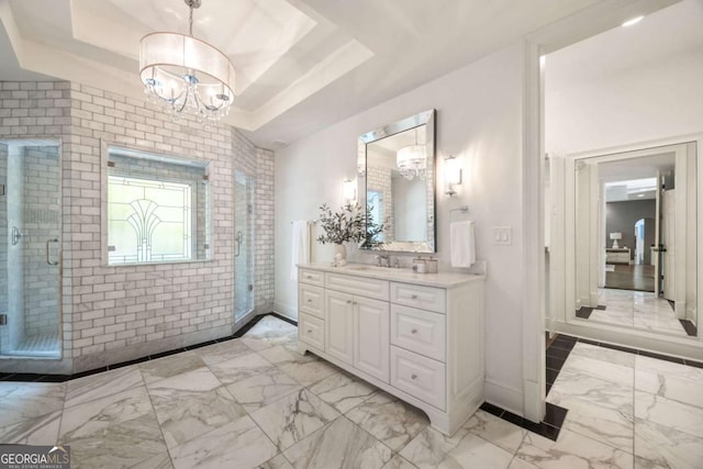 3511 Roxboro Rd NE, Atlanta, GA 30326 - full bath with a tray ceiling, a stall shower, a notable chandelier, marble finish floor, and vanity
