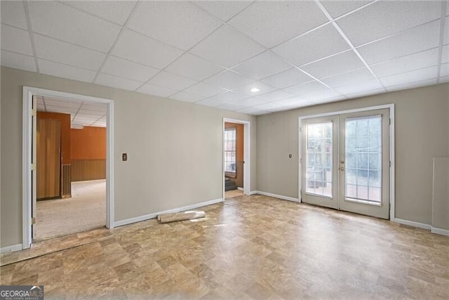 1268 Windsor Glen Dr, Douglasville, GA 30134 - interior space featuring baseboards, a paneled ceiling, and french doors