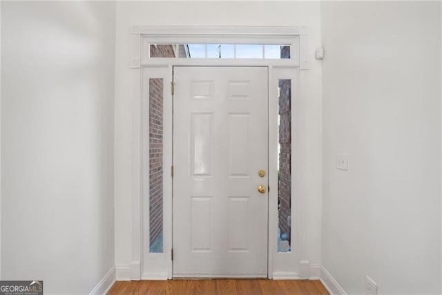 1268 Windsor Glen Dr, Douglasville, GA 30134 - foyer featuring baseboards and light wood-style flooring