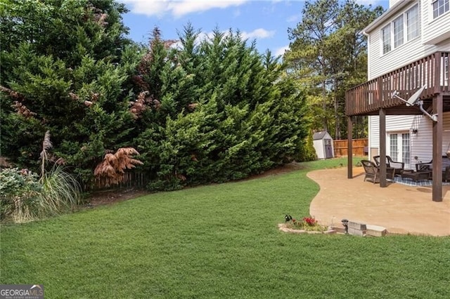 1268 Windsor Glen Dr, Douglasville, GA 30134 - view of yard featuring an outbuilding, a shed, a patio, and a deck