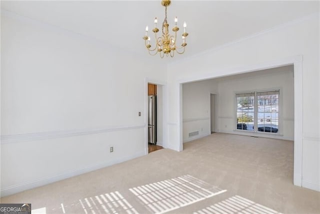 1268 Windsor Glen Dr, Douglasville, GA 30134 - carpeted empty room with crown molding, a chandelier, and visible vents