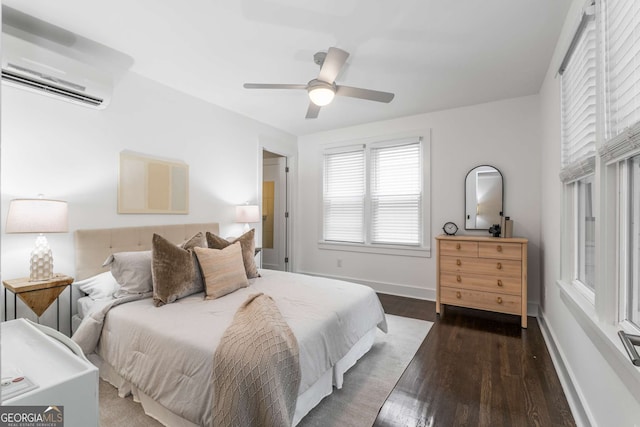 830 Belgrade Ave NE, Atlanta, GA 30306 - bedroom featuring baseboards, wood finished floors, a ceiling fan, and a wall unit AC