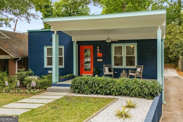 830 Belgrade Ave NE, Atlanta, GA 30306 - doorway to property with a porch, a ceiling fan, and concrete block siding