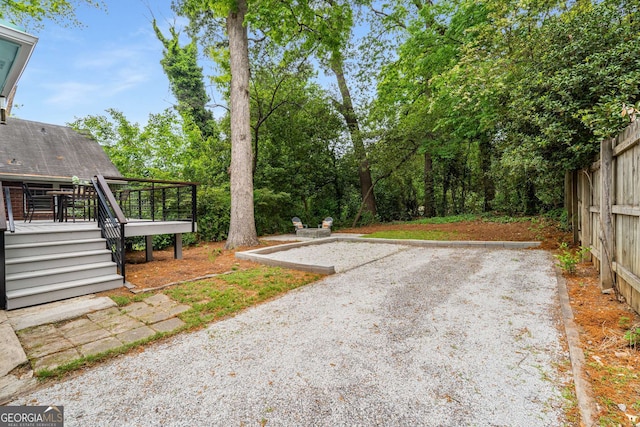 830 Belgrade Ave NE, Atlanta, GA 30306 - view of yard with a wooden deck and stairs
