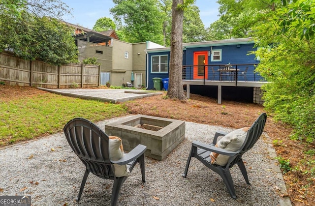 830 Belgrade Ave NE, Atlanta, GA 30306 - back of house with a wooden deck and an outdoor fire pit